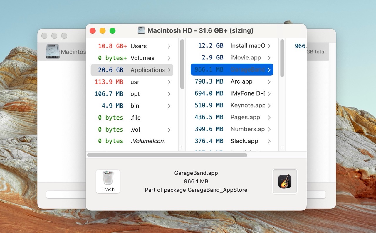 Detailed view in OmniDiskSweeper displaying various folders and files on Macintosh HD, including their sizes, with the "GarageBand.app" highlighted and its size of 966.1 MB displayed, indicating it's a significant item taking up space.